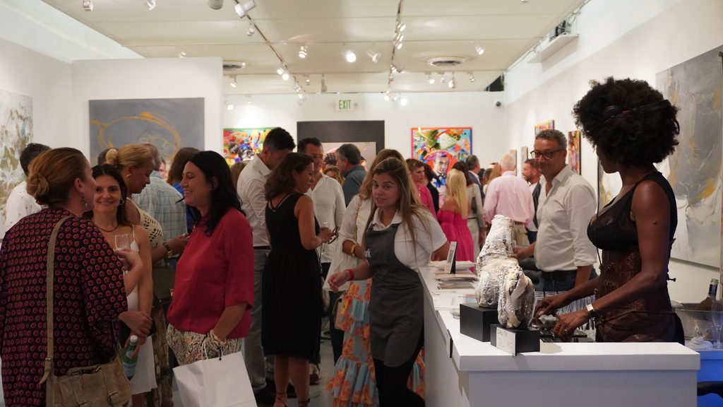 Veronika Paderni with visitors at ArtLabbé Gallery, 2022.