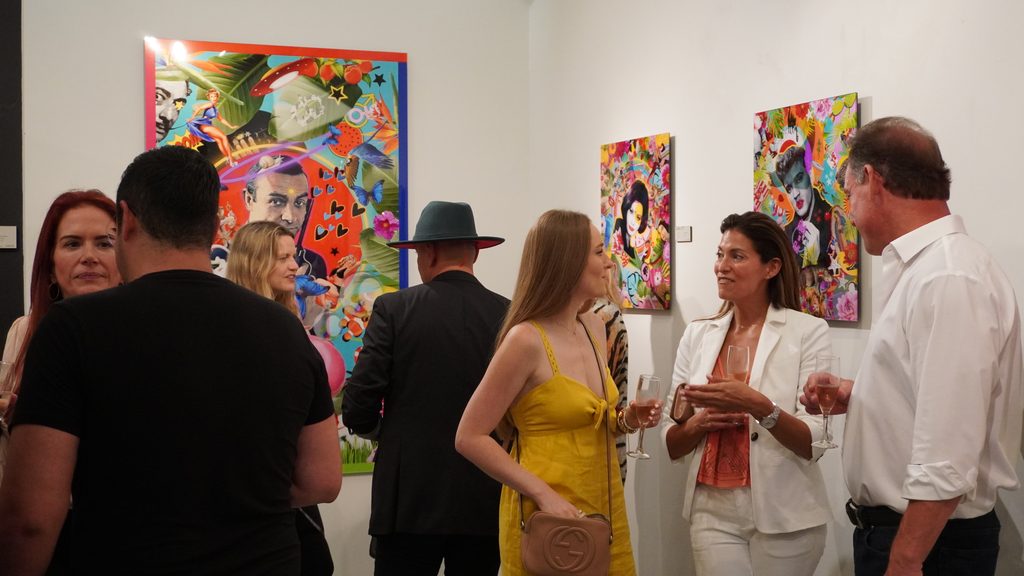 Visitors viewing Galaxy Epop artworks at ArtLabbé Gallery.
