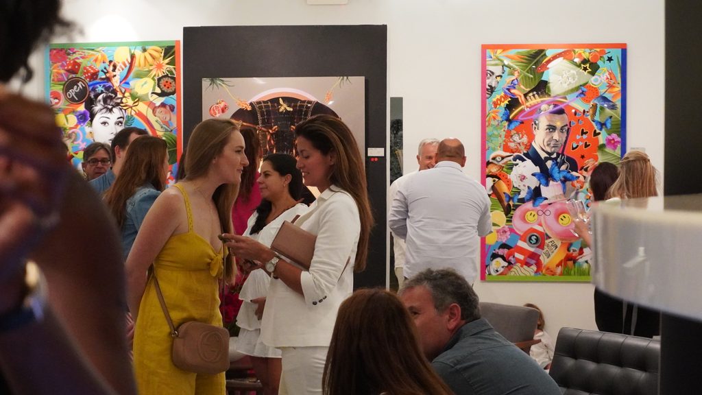 Guests at Veronika Paderni’s exhibition in Coral Gables.